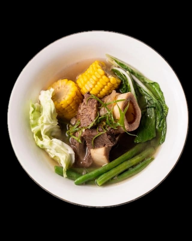 Filipino bulalo beef bone marrow soup served with rice