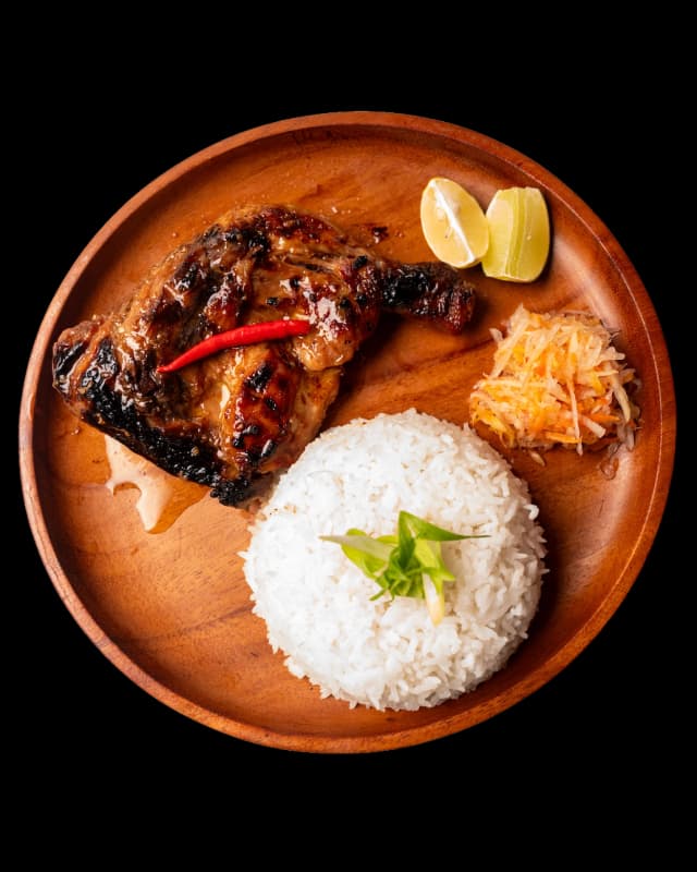 Grilled chicken leg inasal served with unlimited rice
